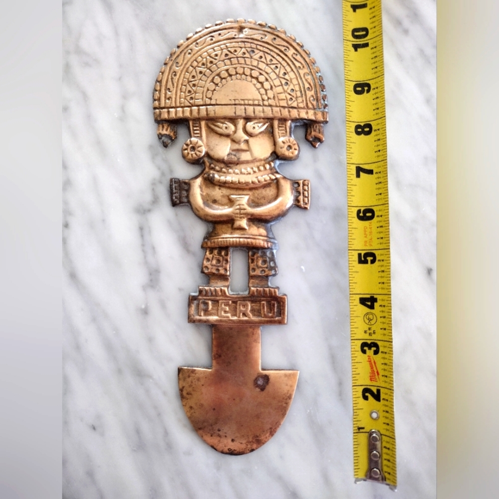 Vintage solid brass wall hanging from Peru
